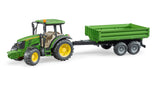 John Deere 5115 M with tipping trailer