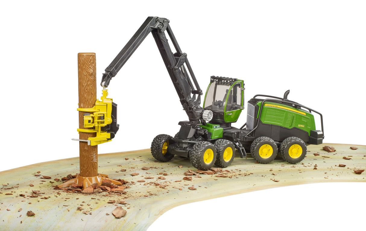 John Deere 1270G harvester with one tree trunk