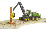 John Deere 1270G harvester with one tree trunk