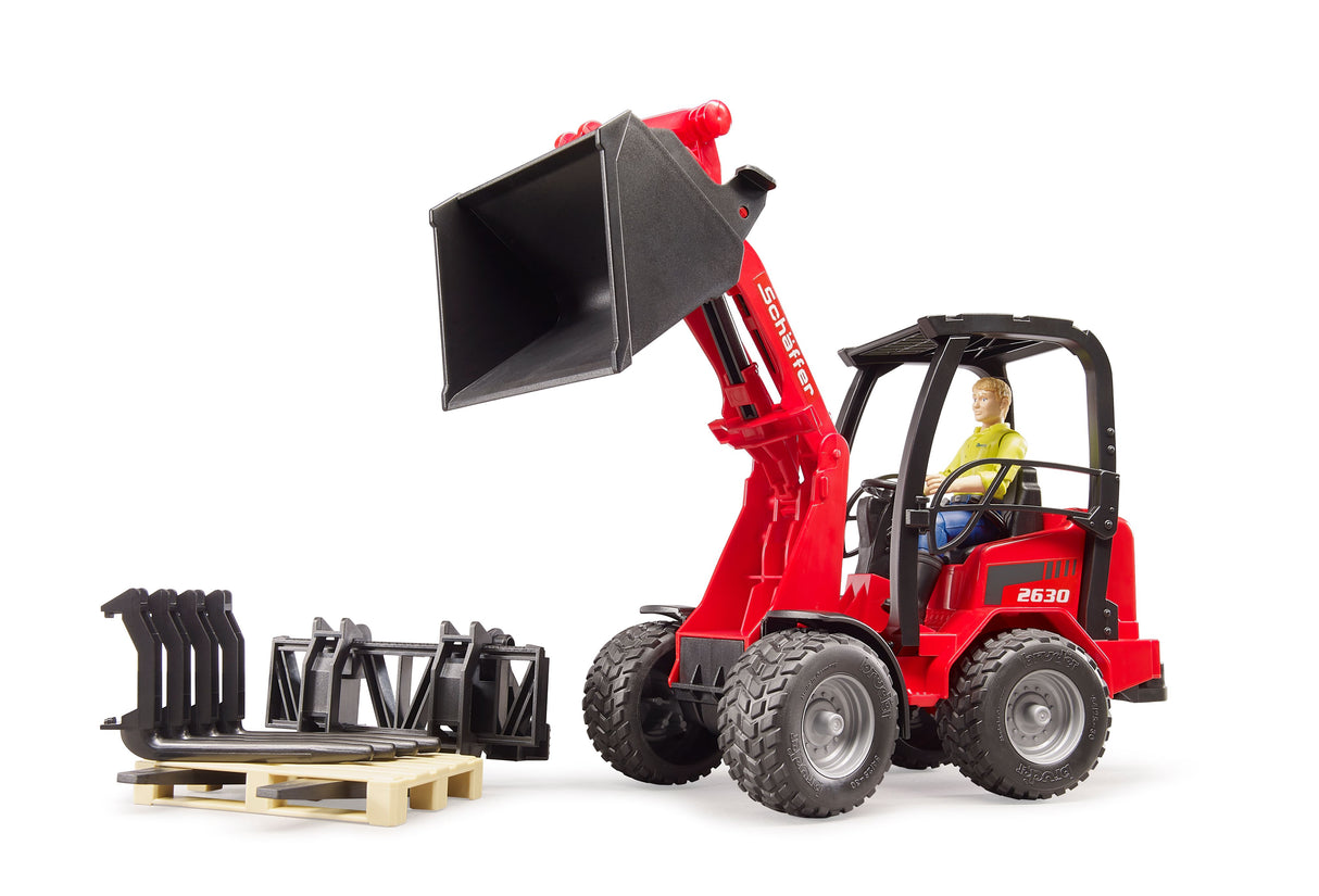 Schäffer Compact loader 2630 with figure and accessories