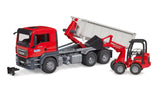 MAN TGS truck with roll-off container and Schäffer yard loader