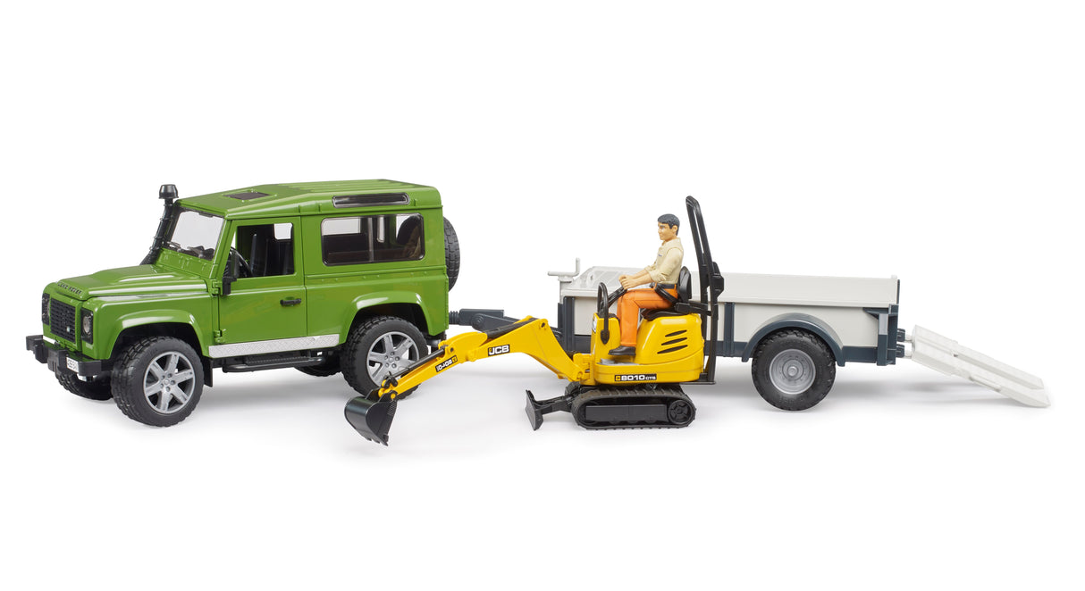 Land Rover Defender with JCB Mini Digger